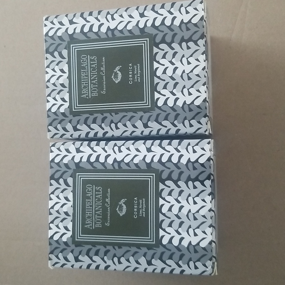 Pair of Archipelago Botanicals Corsica 60 hour candles, lime, negroni & bergamot